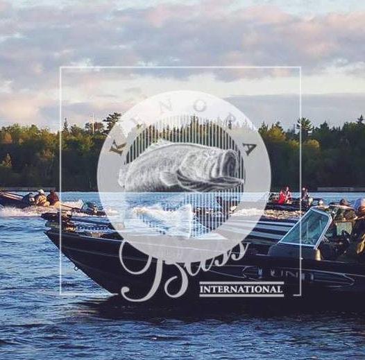 KBI logo in white overtop of a lake secene with bass boats in the background